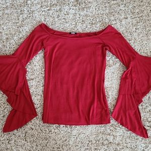 Fun and playful Clayton top. Size S.